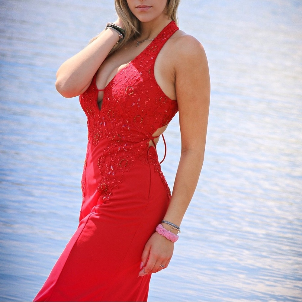 Red plunged neckline prom formal gown